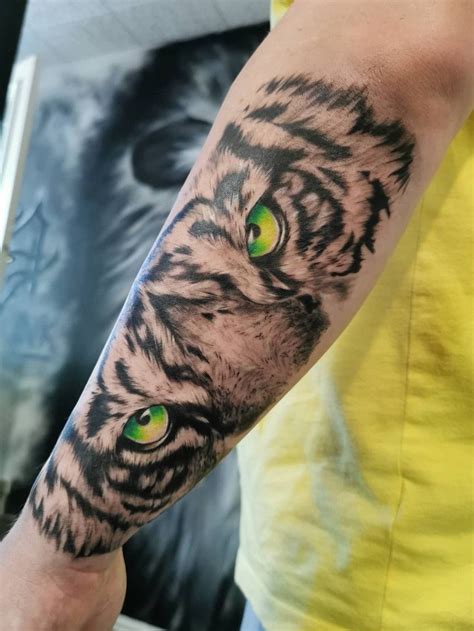 small tiger eye tattoo|The Symbolism of Tiger Eyes Tattoo Designs:。